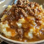 mashed potatoes with ground beef gravy